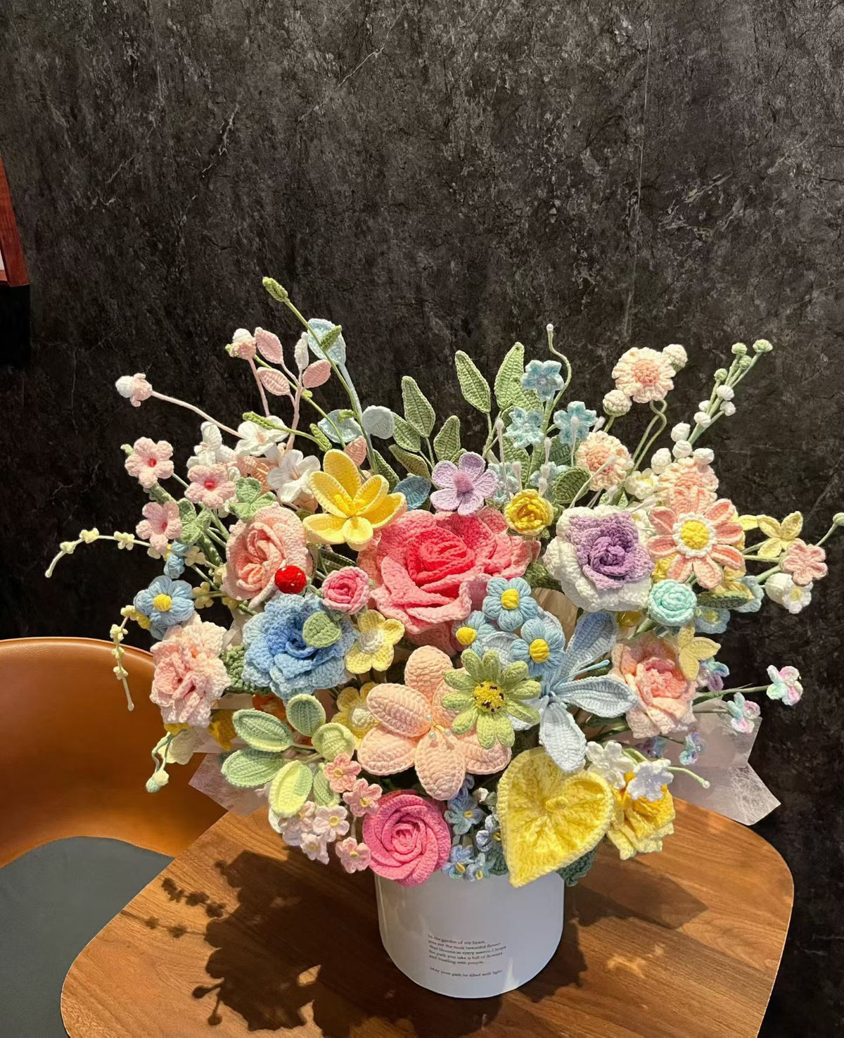 Colourful handmade crochet flower display by COMGO CRAFTS